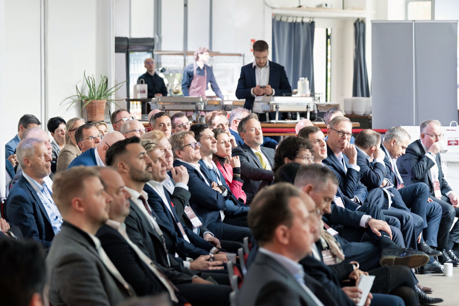 Gefülltes Auditorium bei einer VOTUM-Branchenveranstaltung